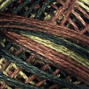 May include: Close-up of a ball of yarn with a mix of dark green, brown, and gold threads.