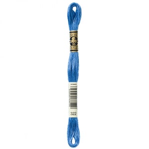 May include: A skein of DMC embroidery floss in color 322, a bright blue. The floss is wound on a white cardboard spool with a gold label that says "DMC" and "322".