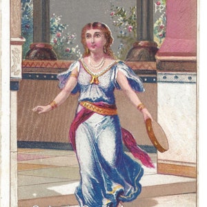 May include: A woman in a blue and white dress with a red sash dances with a tambourine in her hand. She is in a room with a window behind her and a vase on a table to the left. The text "Colonial Crafts Annex" is at the bottom of the image.
