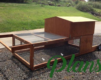 May include: A wooden chicken coop with a wire mesh enclosure and a ramp. The coop has a brown wooden roof and a brown wooden base. The coop is on a gravel surface.