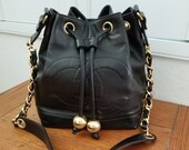 Elegant Classic Black Lambskin Vintage Chanel Drawstring Shoulder Bag Tote with Pouch