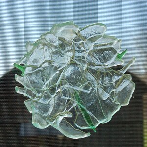 Upcycled glass flower sun catcher made from clear glass recycled bottles