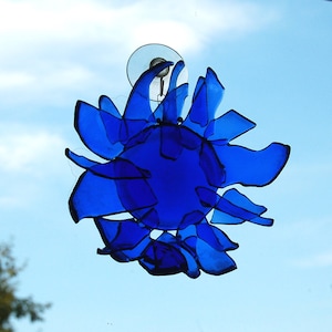 Receptor de sol de flor de vidrio reciclado hecho de botellas recicladas azules