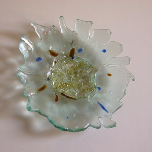 Upcycled glass flower sun catcher made from clear glass recycled bottles