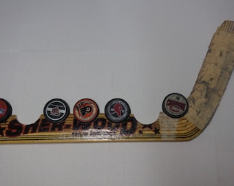 Goalie Stick 7 Puck Display