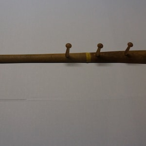 Softball bat hat or coat rack