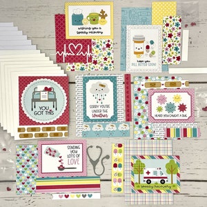 May include: Get well soon cards with various designs featuring cute illustrations of pills, bandages, a hospital bed, a rain cloud, and an ambulance. The cards are printed on white cardstock with colorful patterns and text. The text on the cards includes "Wishing you a speedy recovery", "You got this", "Sorry you're under the weather", "Hope you pill better soon", "Heard you caught a bug", "Sending you lots of love", and "Speedy recovery".