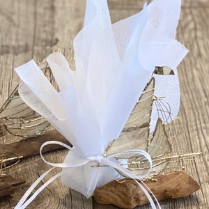 Sailboat bombonieres, ivory tusk, baptism favors