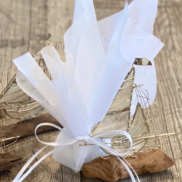 Sailboat bombonieres, ivory tusk, baptism favors