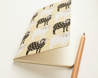 Mini journal covered with black and white rams fine paper