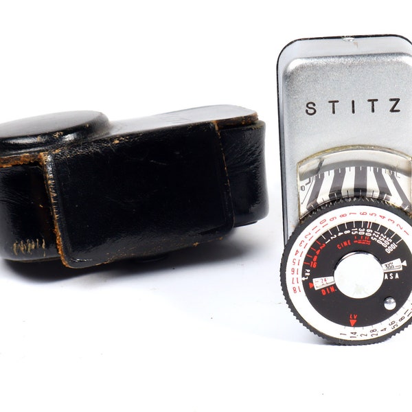 Rare Stitz Camera mounted vintage light meter with original case.