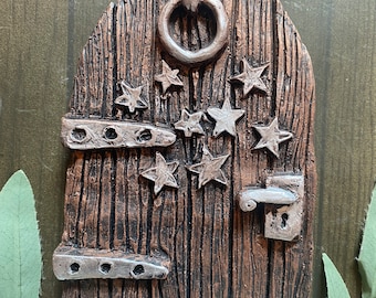 Large Fairy door with stars wall plaque in metallic finish.16cm