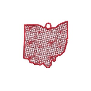 May include: Red embroidered ornament shaped like the state of Ohio. The ornament has a delicate lace design.