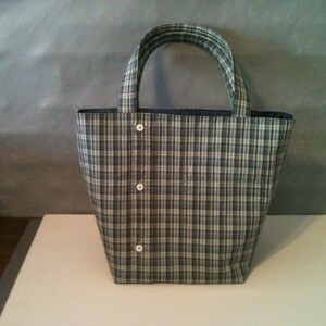 Small tote bag made from a men's button-down shirt. Bag depicted is from a green and blue plaid shirt.