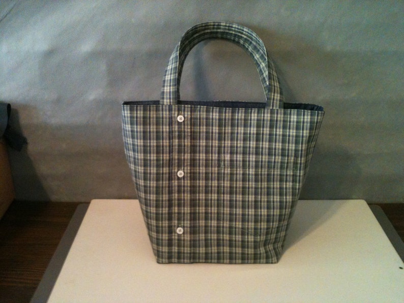 Small tote bag made from a men's button-down shirt. Bag depicted is from a green and blue plaid shirt.