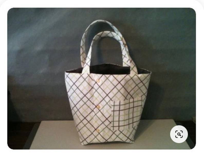 Small tote bag made from a men's button-down shirt. Bag depicted is from a green and tan diagonal plaid shirt.