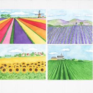 May include: Four watercolor paintings depicting different landscapes. The top left painting shows a field of colorful flowers with a windmill in the background. The top right painting shows a field of lavender flowers with a small house in the background. The bottom left painting shows a field of sunflowers with a small village in the background. The bottom right painting shows a field of green grass with a church in the background.