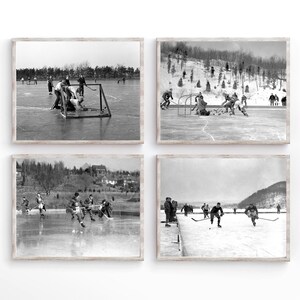 May include: Four black and white photographs of hockey players on a frozen lake. The photos show players skating, passing, and shooting the puck. The photos are framed in a rustic wood frame.
