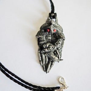 A hand made pendant inspired by The Dark Crystal Garthim cool gothic goth jewellery