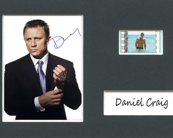 Very Rare Daniel Craig original rare & genuine film cell from the movie mounted ready for framing with pre-printed autograph!