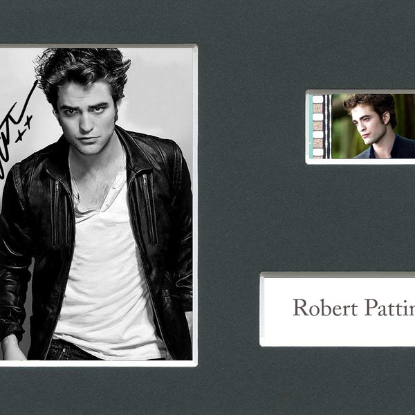 Very Rare Robert Pattinson original rare & genuine limited edition film cell mounted ready for framing with pre-printed autograph!