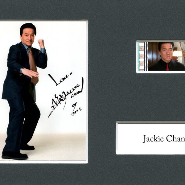 A Very Rare Jackie Chan actor amazing original rare & genuine film cell mounted with pre-printed autograph ready for framing!