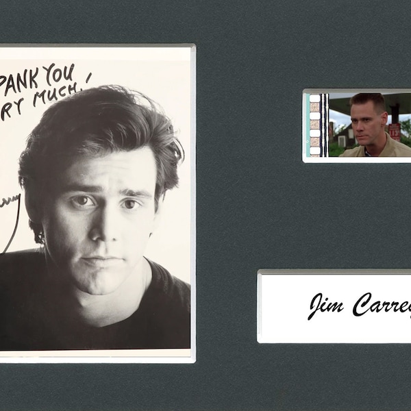 Very Rare Jim Carrey original rare & genuine film cell from the movie mounted ready for framing with pre-printed autograph!