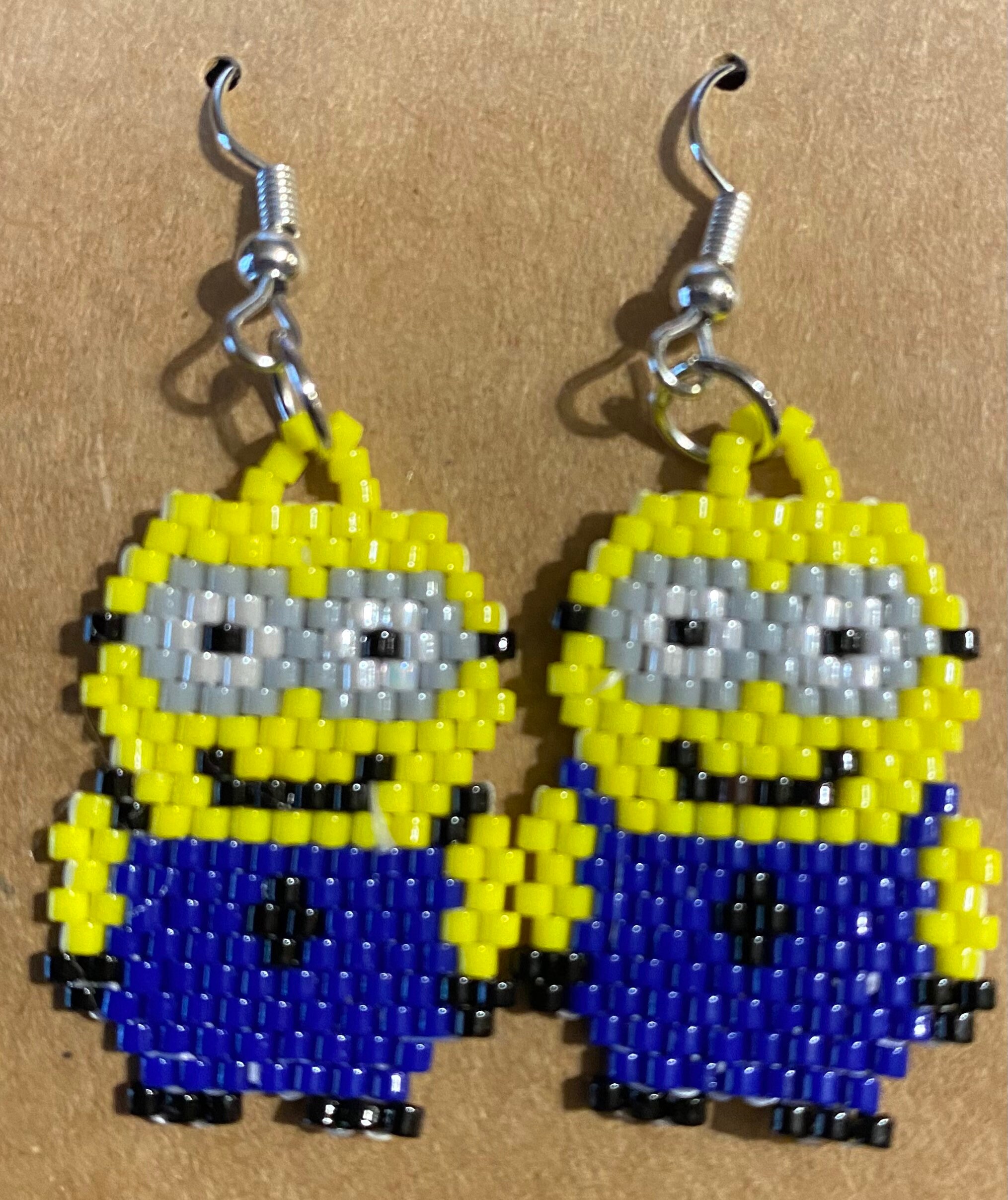 Minion earrings deals