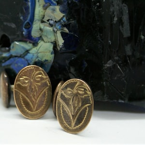 Boutons de manchette vintage avec motif floral