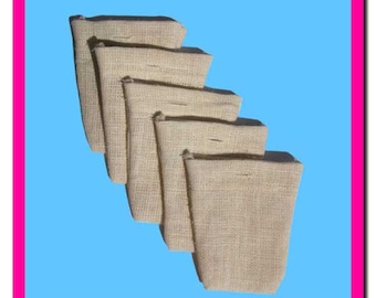 May include: Six small, natural burlap pouches stacked on top of each other. The pouches are made of a woven fabric and have a natural, earthy color.