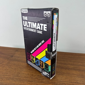 Vintage 2000s Ultimate Entertainment Game - Shaped like VCR Cassette - Complete - Unplayed