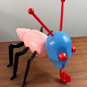 Vintage 1949 Single Giant Cootie Bank/Figure