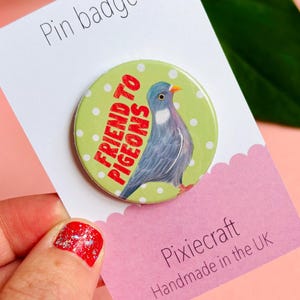 cute pigeon hand drawn badge on a green and white polka dot background that reads friend to pigeons. gift for pigeon lovers