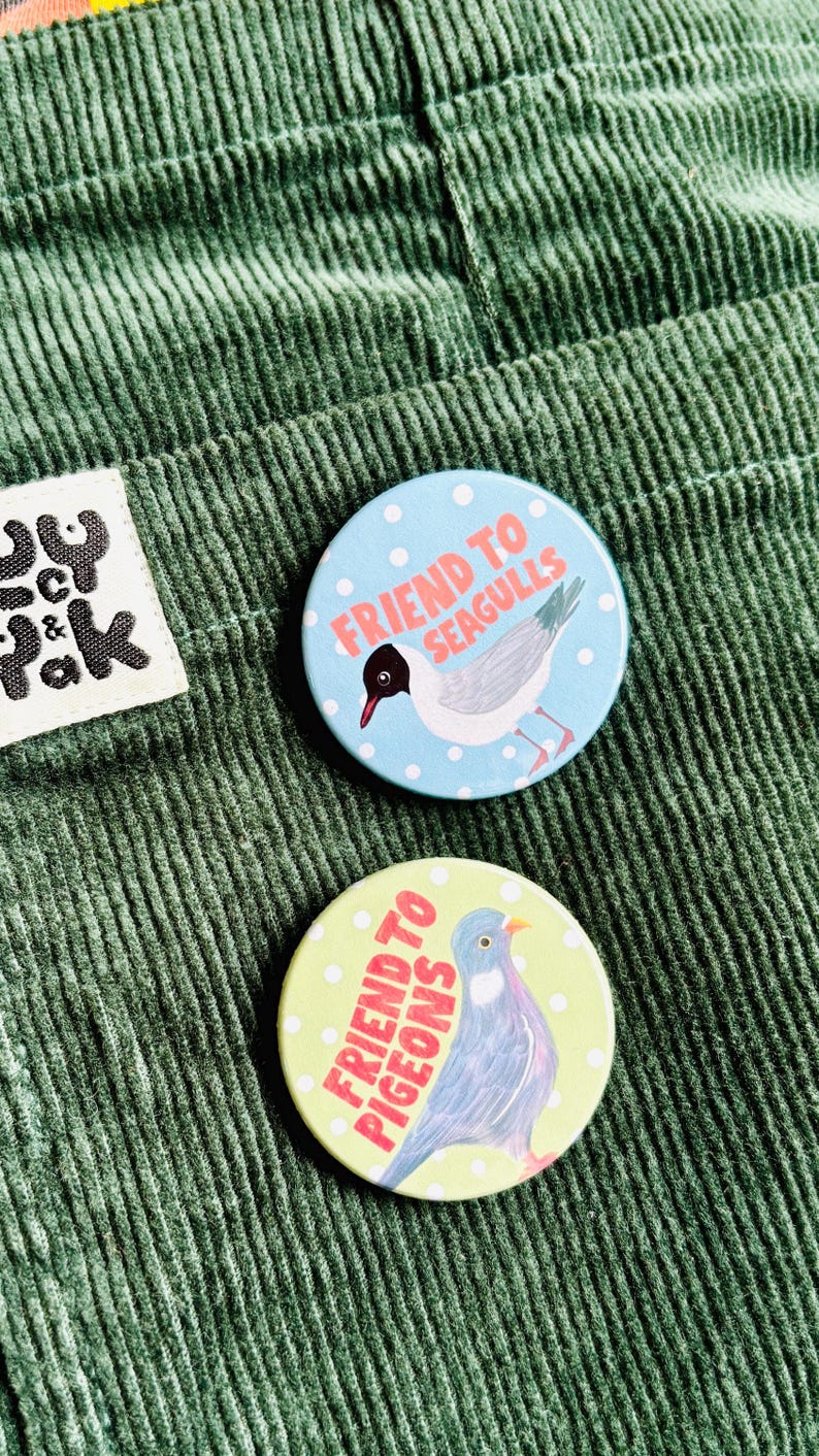cute pigeon hand drawn badge on a green and white polka dot background that reads friend to pigeons. perfect gift for pigeon lovers