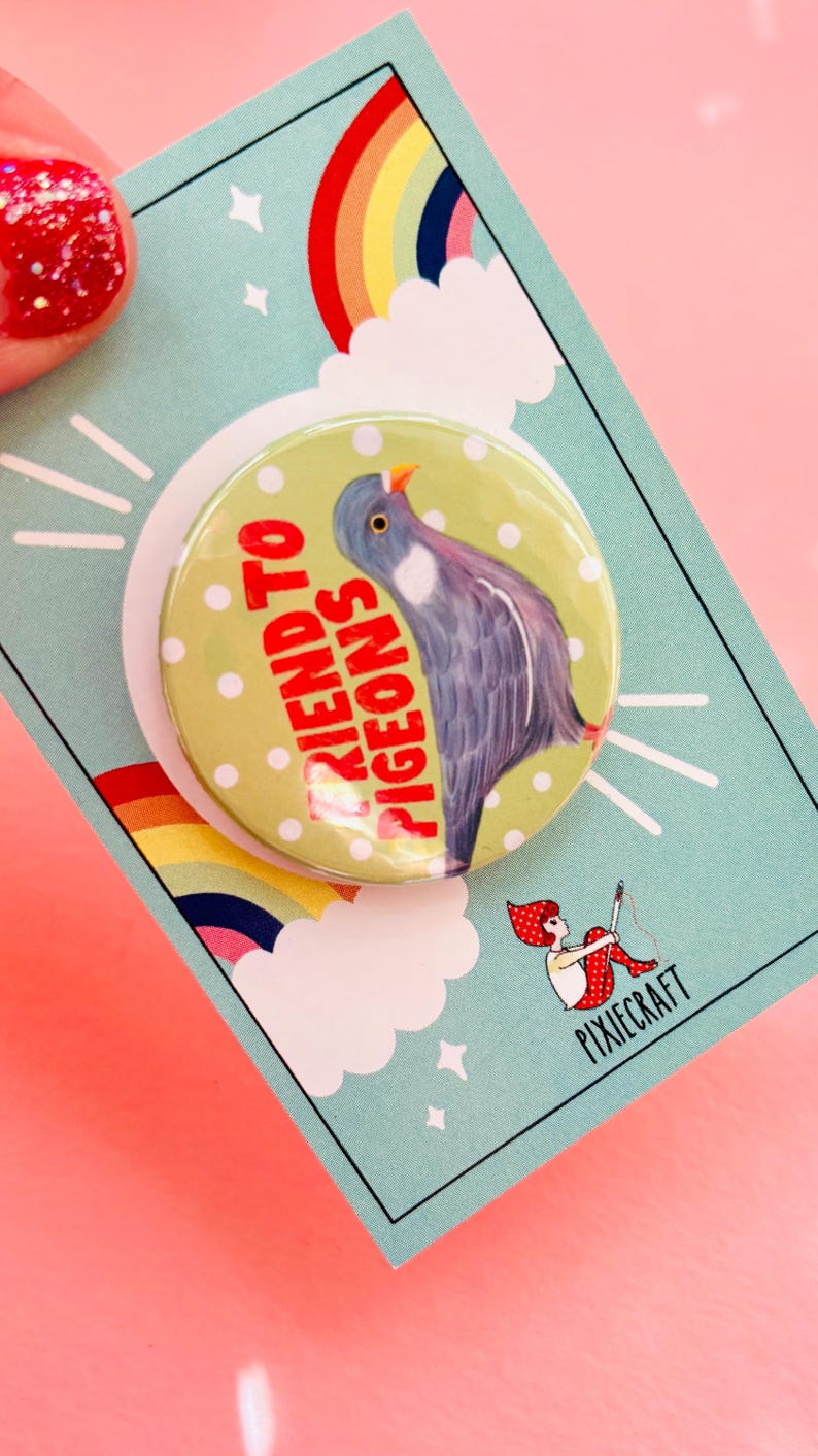 cute pigeon quirky handmade badge m on a green and white polka dot background that reads friend to pigeons. The cute pin is presented on a colourful gift card