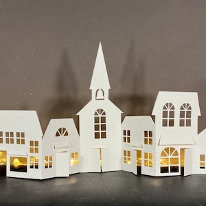 Pueblo navideño DIY SVG y PDF, archivo de corte de pueblo invernal, plantilla de manualidades navideñas, descarga de manualidades de papel, proyecto de decoración de invierno