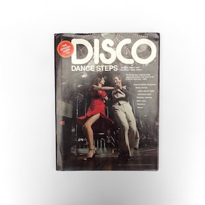 May include: Vintage book cover titled "Disco Dance Steps" featuring a couple dancing. The cover has a dark background with the word "DISCO" in large white letters. A red circle with text is in the upper left corner.
