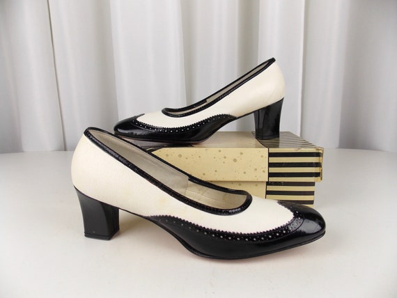 black and white spectator pumps