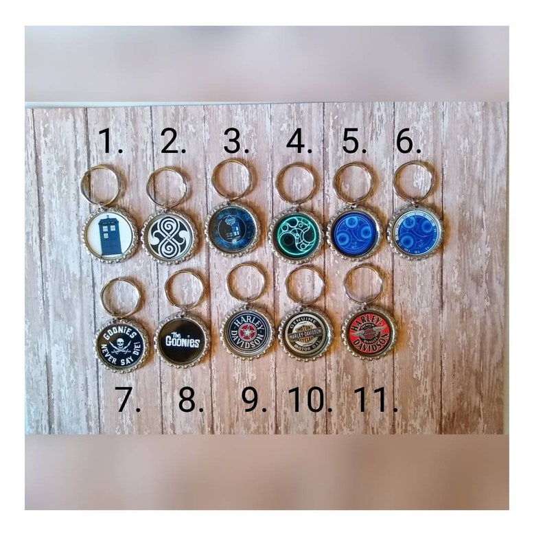 Goonies bottle cap key chains Who Harley Davidson back pack charms Dr zipper pulls
