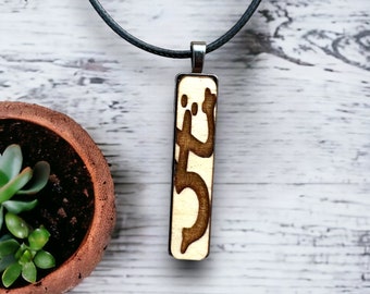 Taino Coqui Sol Pendant Necklace: engraved wood Puerto Rico Art Jewelry