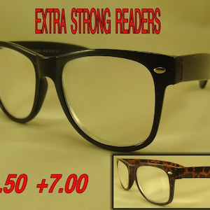 May include: Black-framed reading glasses with clear lenses. The glasses have a classic, rectangular shape. The text "EXTRA STRONG READERS" is displayed above the glasses. The numbers "+6.50 +7.00" are displayed below the glasses. A smaller image of glasses with a leopard print frame is in the bottom right corner.