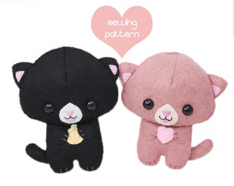 May include: Sewing pattern for two felt cat plushies. One black cat holding a yellow carrot and one pink cat holding a pink heart.