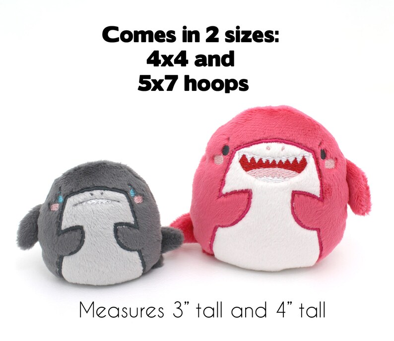 May include: Two plush shark toys, one pink and one gray, with embroidered details. The pink shark is 4 inches tall and the gray shark is 3 inches tall. The text "Comes in 2 sizes: 4x4 and 5x7 hoops" is above the toys. The text "Measures 3" tall and 4" tall" is below the toys.