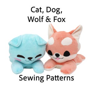 May include: Two plush animal toys: a light blue dog and a peach-colored fox. The dog has floppy ears and a smiling face. The fox has white spots and a black nose. Text above reads "Cat, Dog, Wolf & Fox" and below reads "Sewing Patterns".