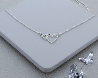 Collana in argento sterling con cuori infiniti