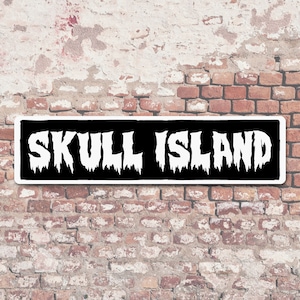 Cartello in metallo Skull Island 6" x 24".