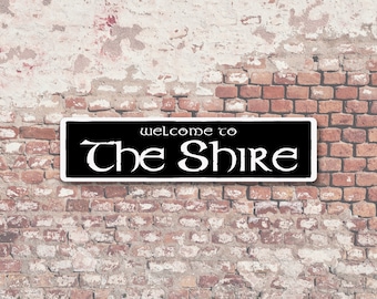 Benvenuti al cartello in alluminio personalizzato The Shire 6" x 24".