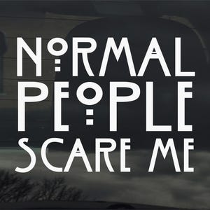 May include: White text on a dark background reads "NORMAL PEOPLE SCARE ME." The text is in a bold, sans-serif font, with the letters stylized. The image appears to be a decal or sticker.
