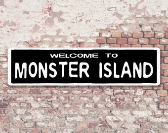 Welcome to Monster Island 6" x 24" Aluminum Sign