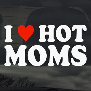 May include: White vinyl decal with the text "I love HOT MOMS" and a red heart.